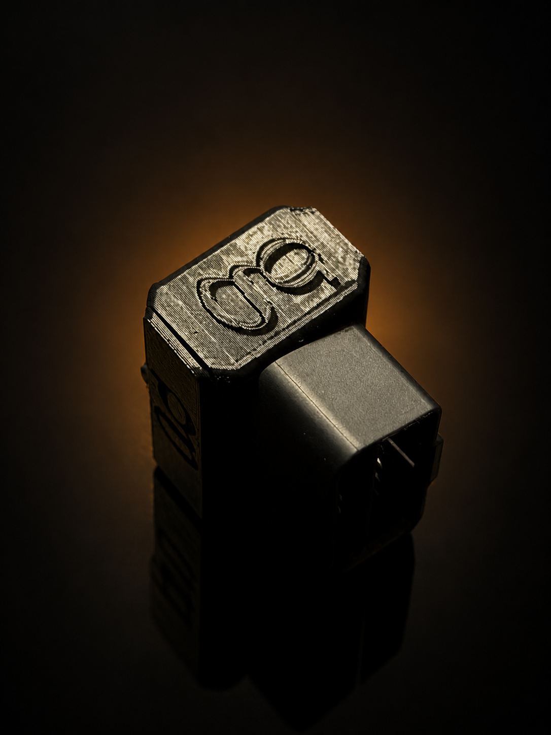 Project module and connector on a dark reflective surface